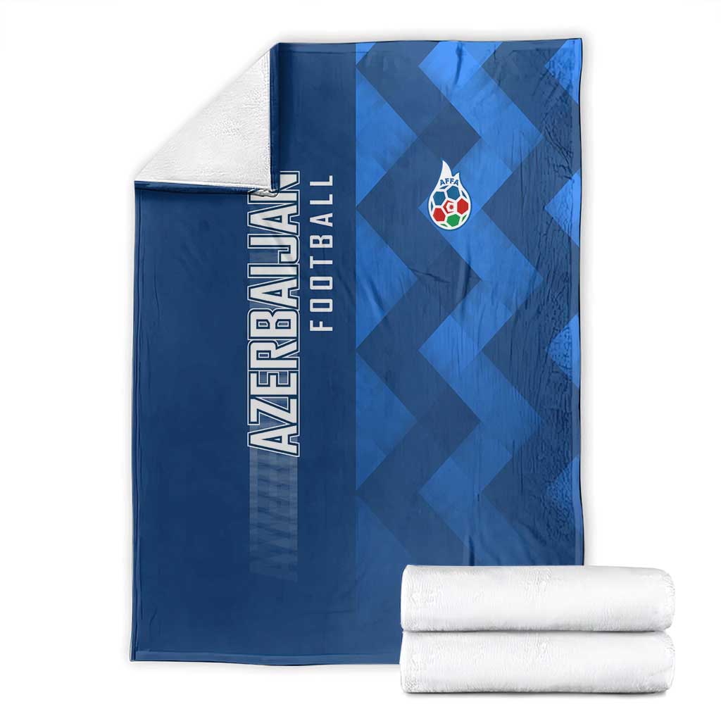 Blue football blanket with Azerbaijan wordmark, AFFA emblem, and geometric pattern, with rolled set