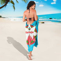 Sky-blue Azerbaijan emblem sarong with flame and star design
