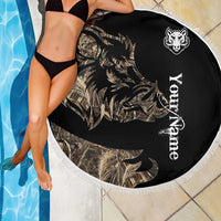 Round black camouflage beach blanket featuring boar emblem, custom text, and white fringed edge