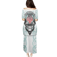 Long off-white dress, teal vine print, Odin helmet graphic on back