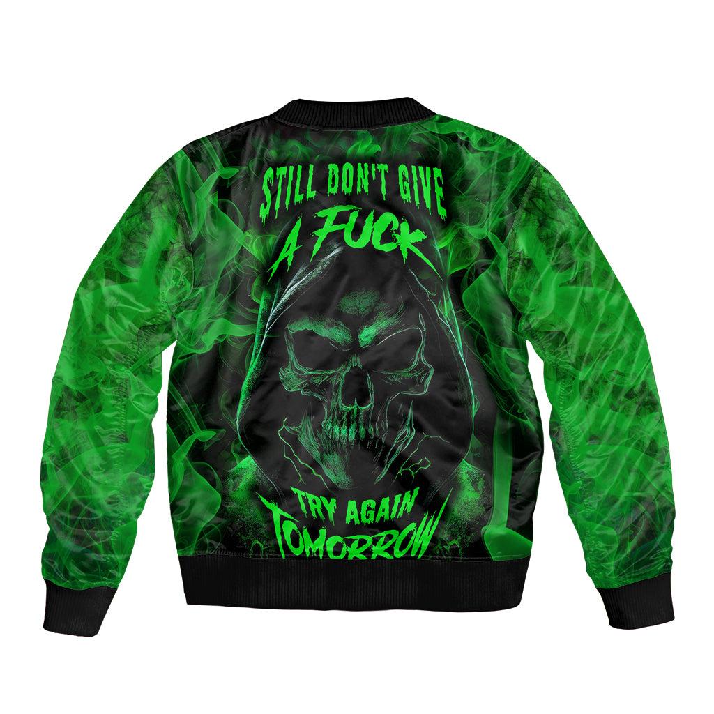 Black/green bomber jacket with skull graphic on back, ribbed collar and hem.