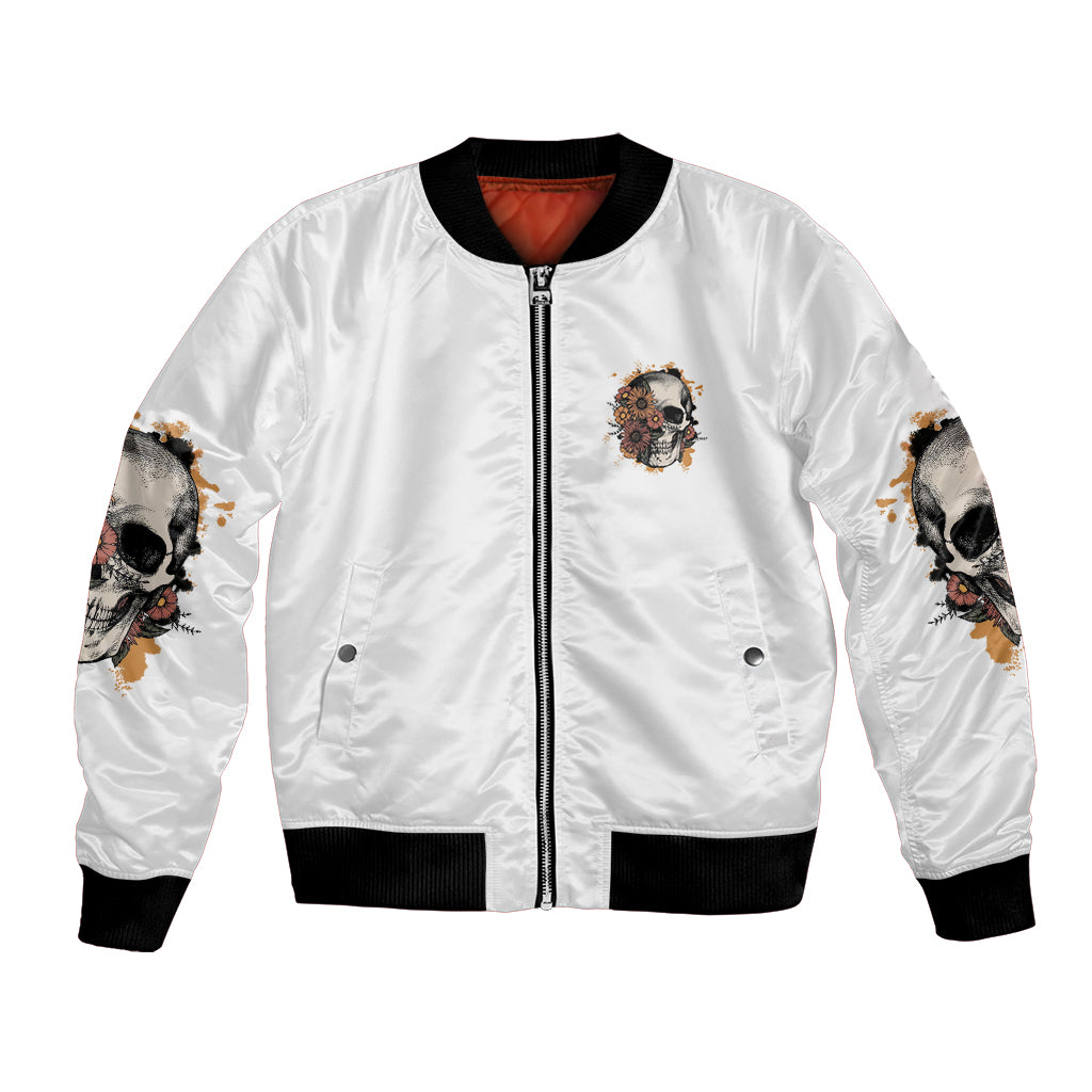 White bomber jacket with front zipper, skull-and-flower patch, black ribbed cuffs