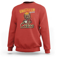 Red crewneck sweatshirt with engineer dog fueled by coffee back print