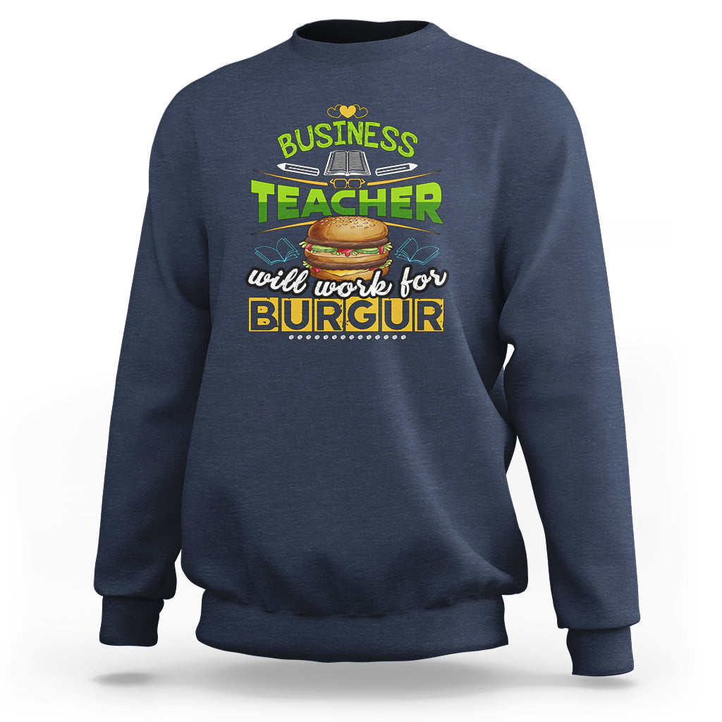 Navy crewneck sweatshirt with Business Teacher burger graphic on the chest