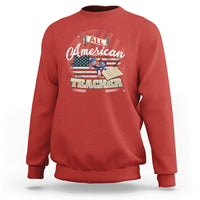 Red crewneck sweatshirt with “All American Teacher” graphic on the front.