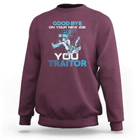 Maroon crewneck sweatshirt with “GOOD BYE ON YOUR NEW JOB” and “YOU TRAITOR” graphic