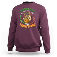 Maroon sweatshirt with colorful 'Good Luck' and 'You Traitor!' cat graphic on front