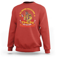 Red firefighter sweatshirt with colorful 'THEN' graphic and fire-emblem print on chest.