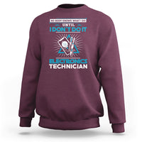 Maroon crewneck sweatshirt with blue electronics technician graphic and slogan print.