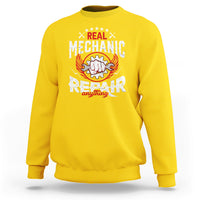 Yellow sweatshirt with mechanic repair graphic and crew neck, long sleeves