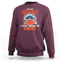 Maroon crewneck sweatshirt with event specialist graphic print on chest