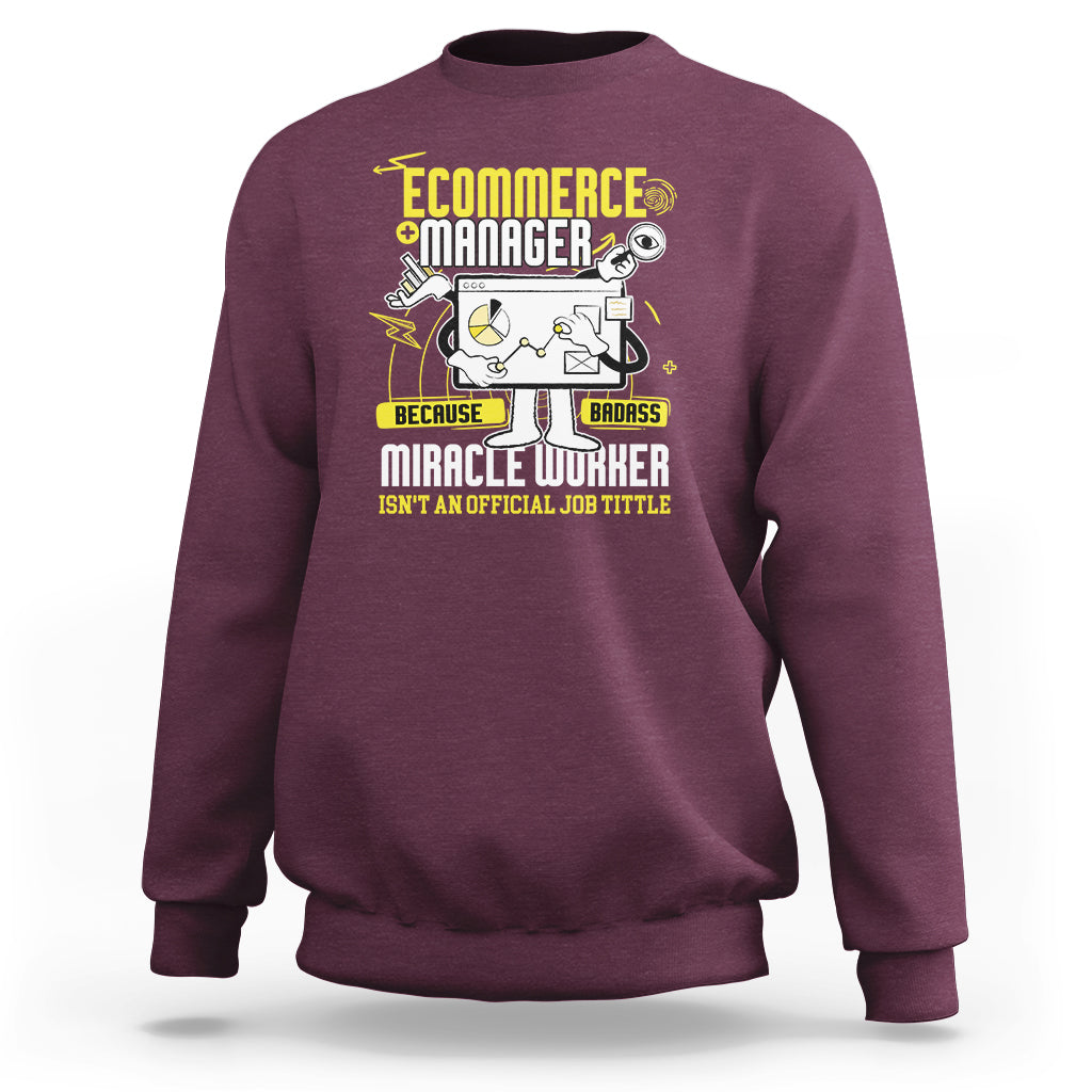 Maroon crewneck sweatshirt with front “Ecommerce Manager” graphic and text.