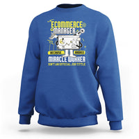 Royal blue crewneck sweatshirt with front “Ecommerce Manager” graphic and text.