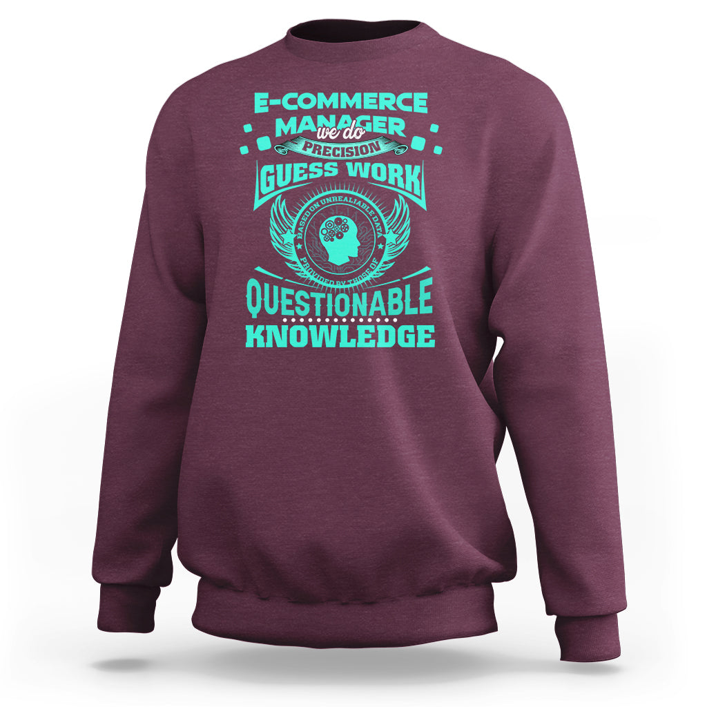 Maroon crewneck sweatshirt with teal graphic and winged circular “Questionable Knowledge” print