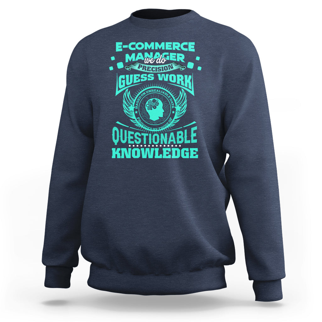 Navy crewneck sweatshirt with teal graphic and winged circular “Questionable Knowledge” print