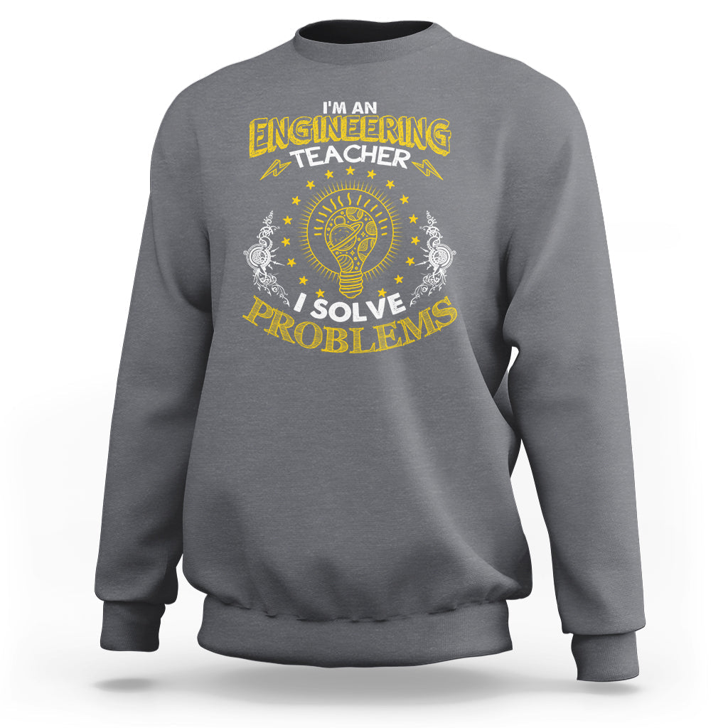 Charcoal engineering teacher sweatshirt with “I solve problems” engineering emblem graphic