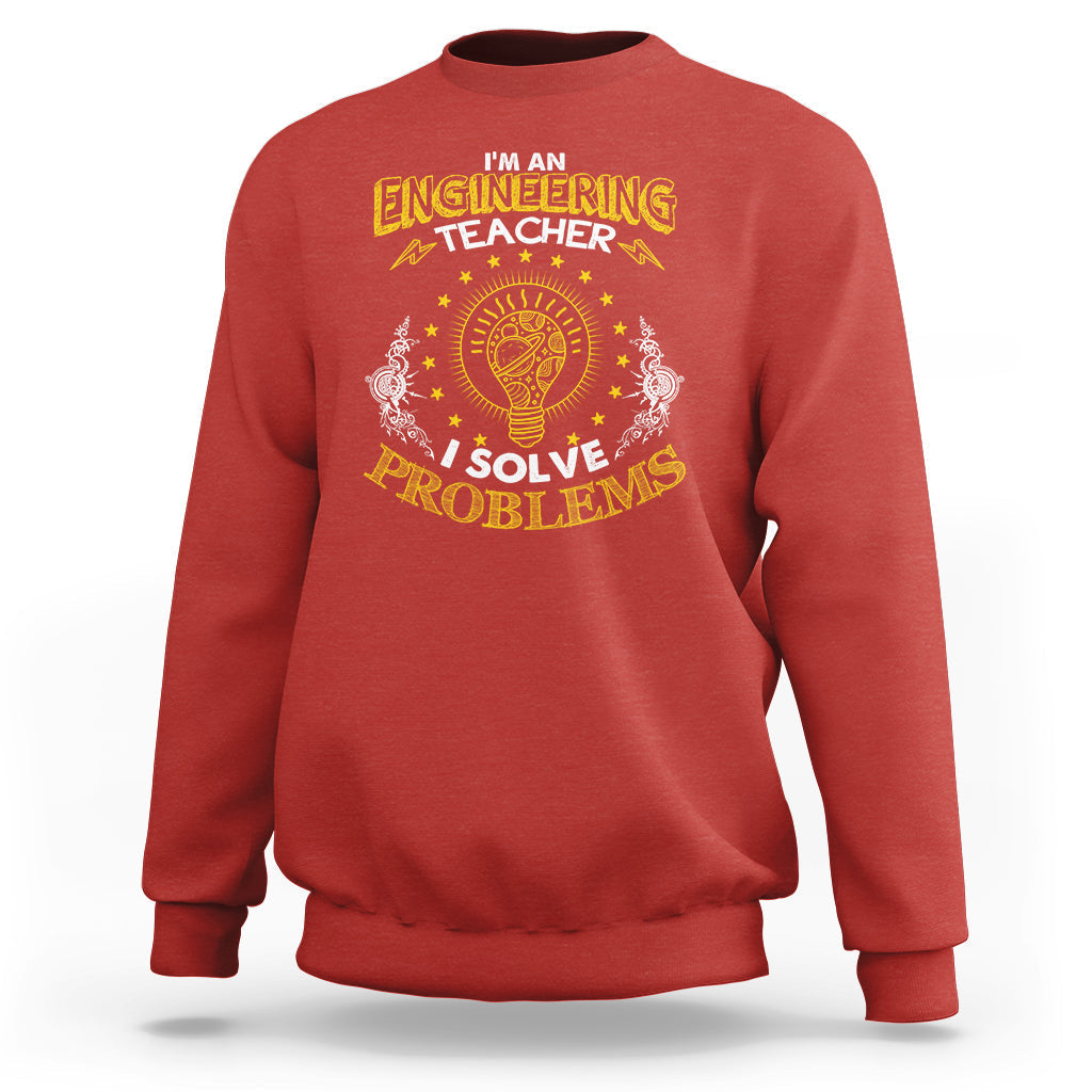 Red engineering teacher sweatshirt with gold “I solve problems” engineering emblem graphic