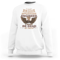 White crewneck sweatshirt with large gold and brown engineer graphic on chest.