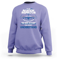 Violet sweatshirt with “Aviation Inspector” chest graphic in white and blue