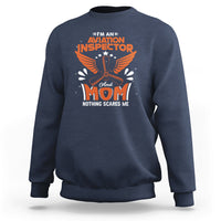 Navy crewneck sweatshirt with “Aviation Inspector Mom” eagle graphic on front