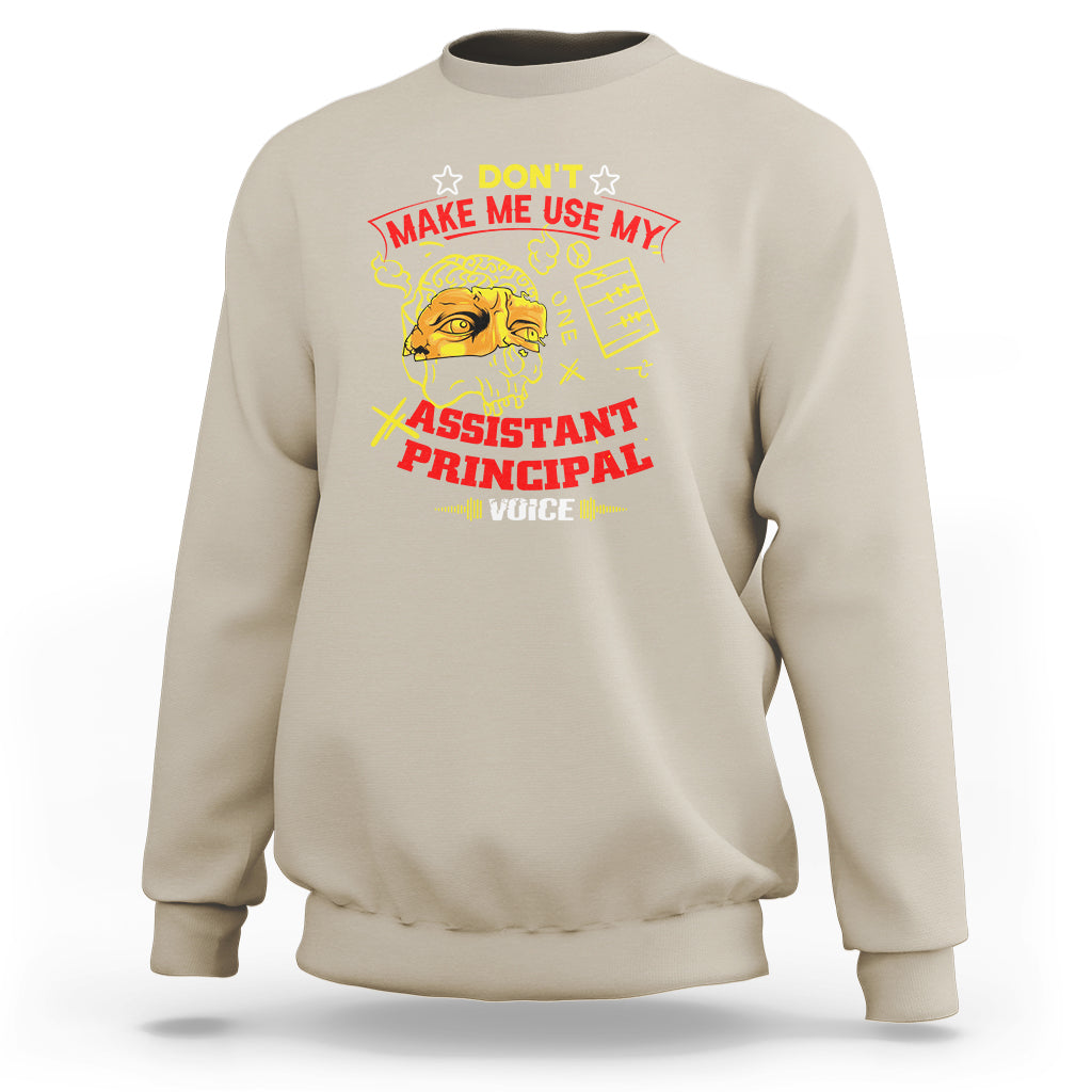 Sand crewneck sweatshirt with colorful 'Assistant Principal Voice' graphic on front