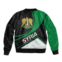 Green and black bomber jacket with crest emblem, Syria text, and ribbed cuffs