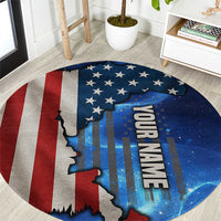 Round blue patriotic graphic carpet with red-white stripes, stars, and map silhouette