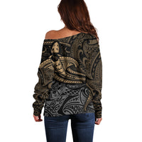 Women’s off-shoulder sweater, back view, black with yellow/gray tribal pattern
