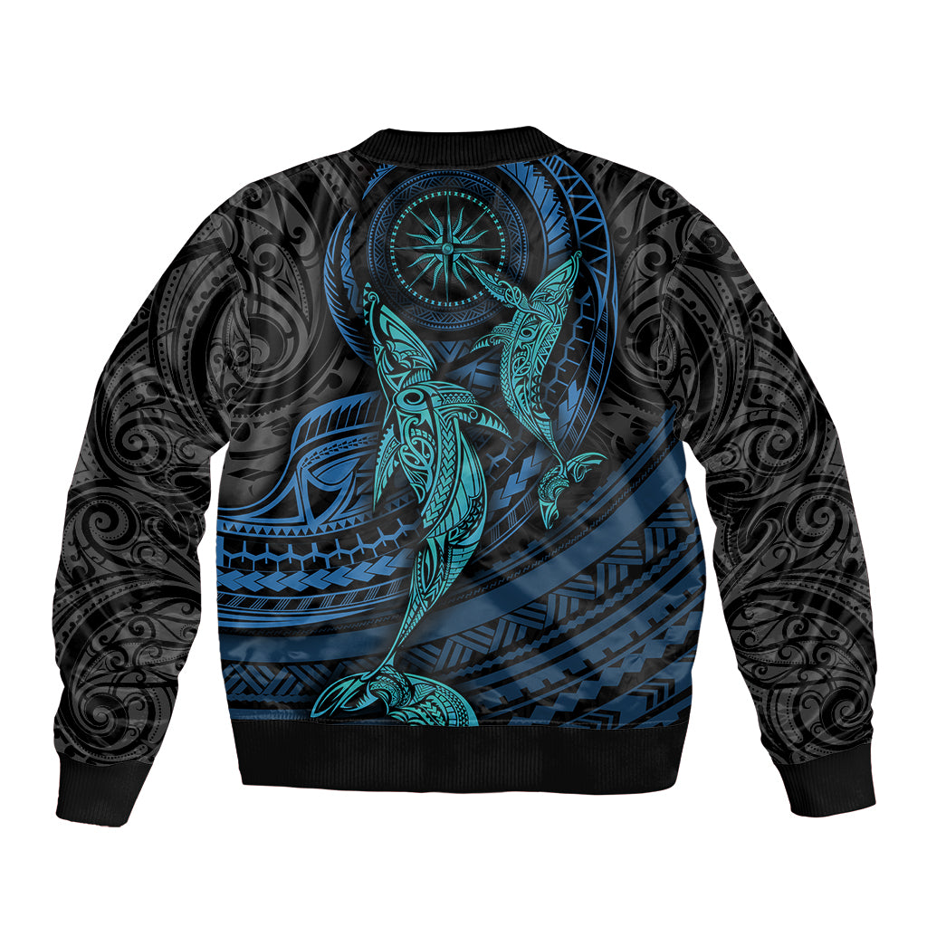 Unisex black bomber jacket with cyan whale and bold geometric Polynesian artwork, ribbed collar