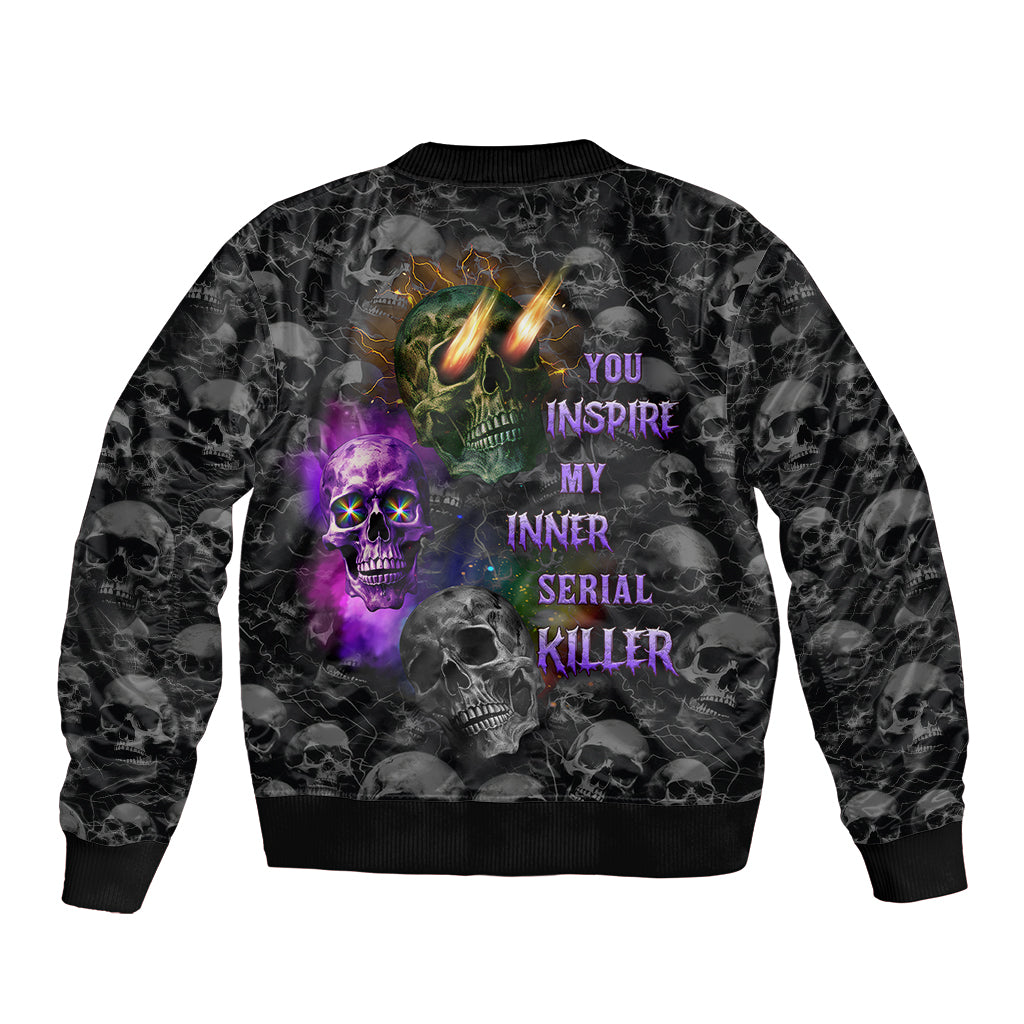 Black bomber jacket with multicolor skull graphic and stacked text print on back