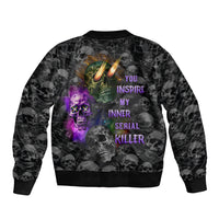 Black bomber jacket with multicolor skull graphic and stacked text print on back