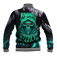 Black baseball jacket with teal skull graphic, ribbed striped collar and cuffs