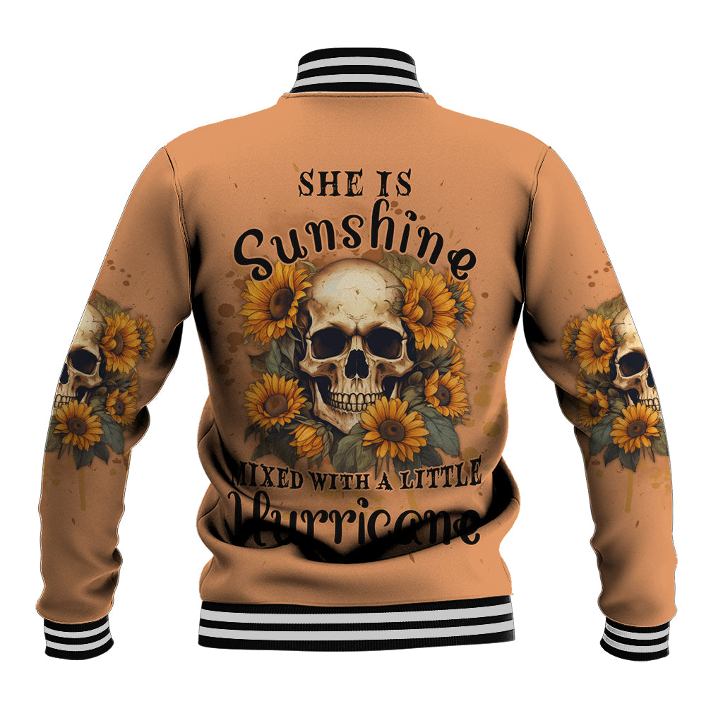 Unisex tan baseball jacket, back sunflower skull graphic; striped ribbed collar and cuffs.