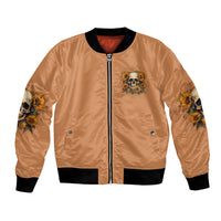 Unisex tan bomber jacket with front zipper, skull sunflower patch, ribbed knit cuffs