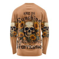 Tan long-sleeve shirt with sunflower skull graphic and 'She is Sunshine' text on back