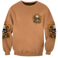 Brown sweatshirt with small sunflower skull chest graphic, long sleeves