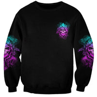 Black unisex sweatshirt with small skull print on chest and purple-blue sleeve accents