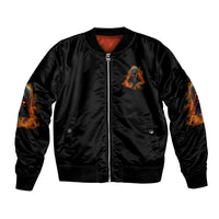 Black bomber jacket with front zip and flame skull patch on chest, orange sleeve graphics