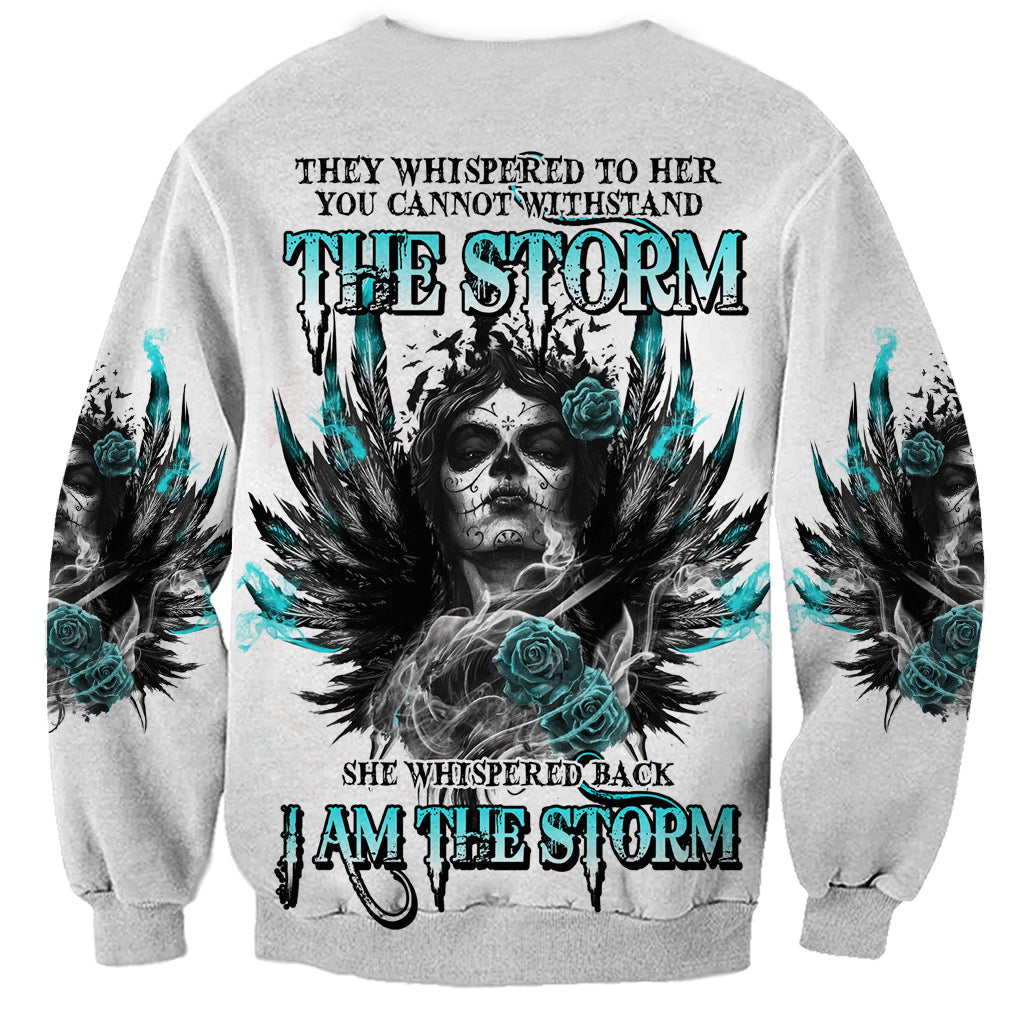 Unisex gray sweatshirt with sugar skull, teal roses, and feathered wings graphic