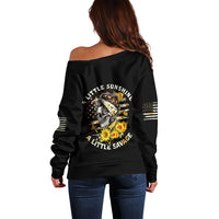 Off-shoulder black sweatshirt with skull graphic on back, yellow accents, striped sleeves