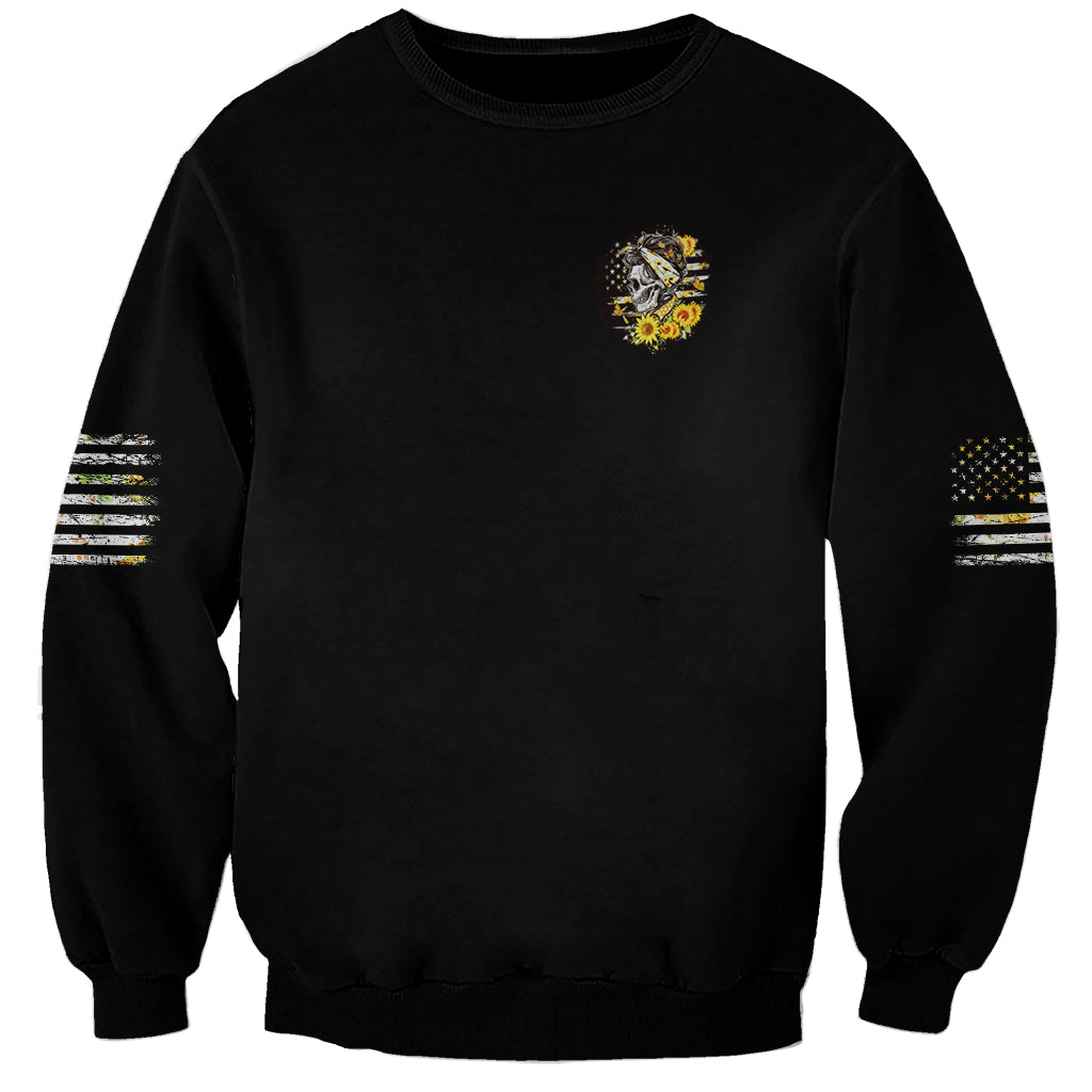 Unisex black crewneck sweatshirt with small skull emblem, striped sleeves