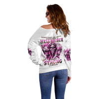 Women’s white off-shoulder sweater with purple skull back graphic, long sleeves