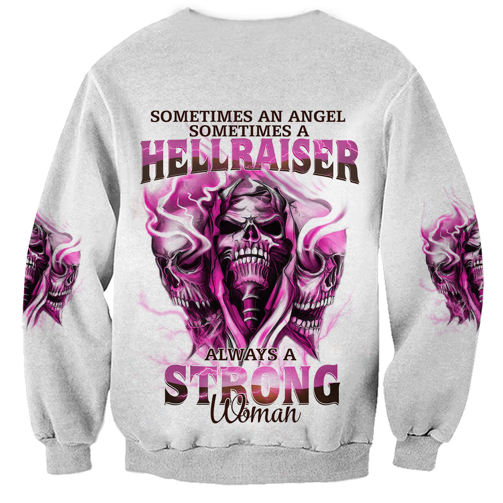 Gray crewneck sweatshirt with purple skull graphic and back text, long sleeves