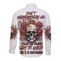 White long-sleeve button shirt with large skull and roses graphic on back
