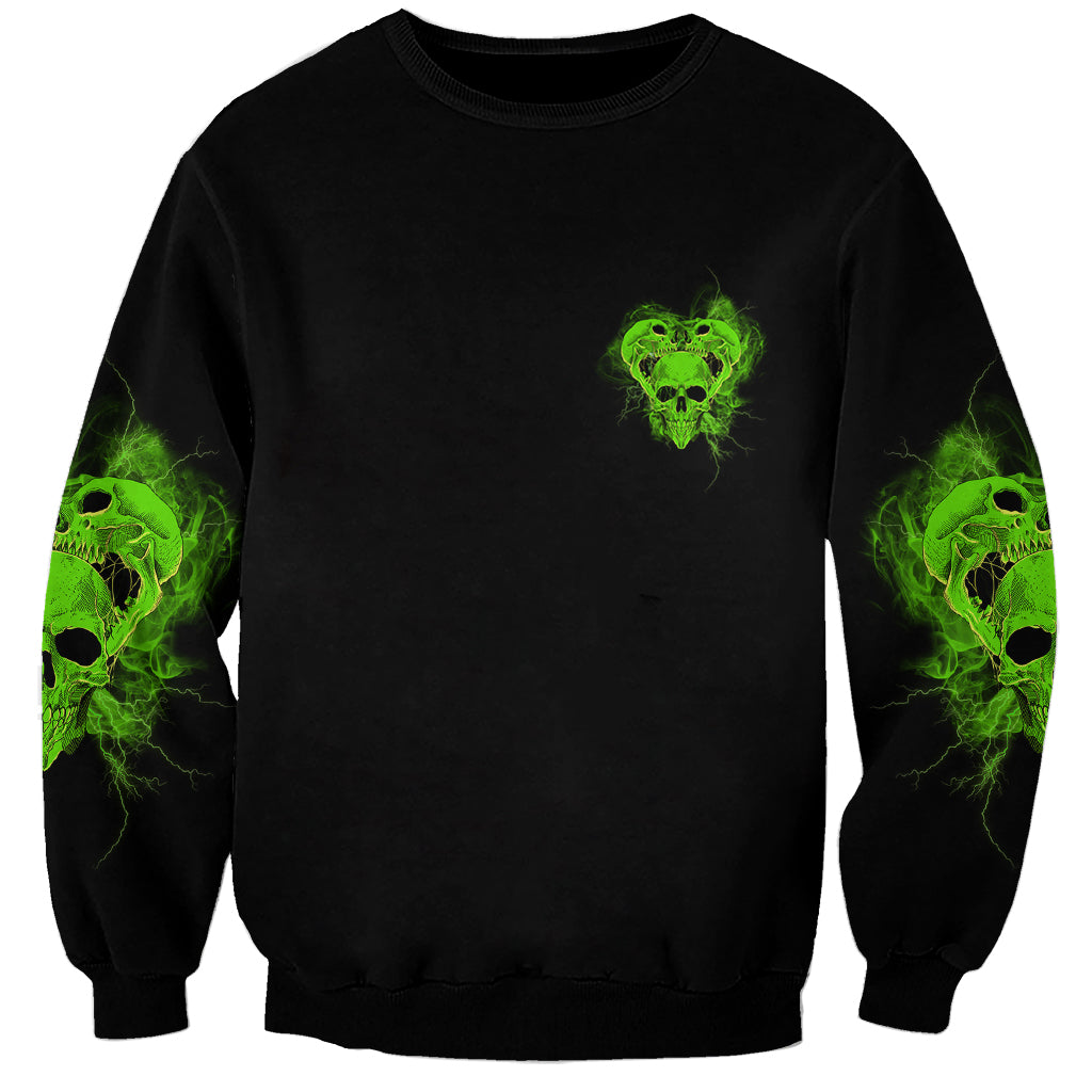 Black unisex sweatshirt with small neon green skull on chest and sleeve graphics