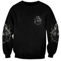 Unisex black sweatshirt with small witch graphic on chest and lightning sleeve prints