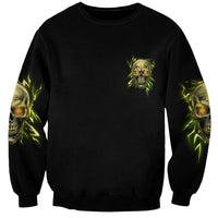 Black unisex sweatshirt with small neon green skull chest print and matching sleeve art