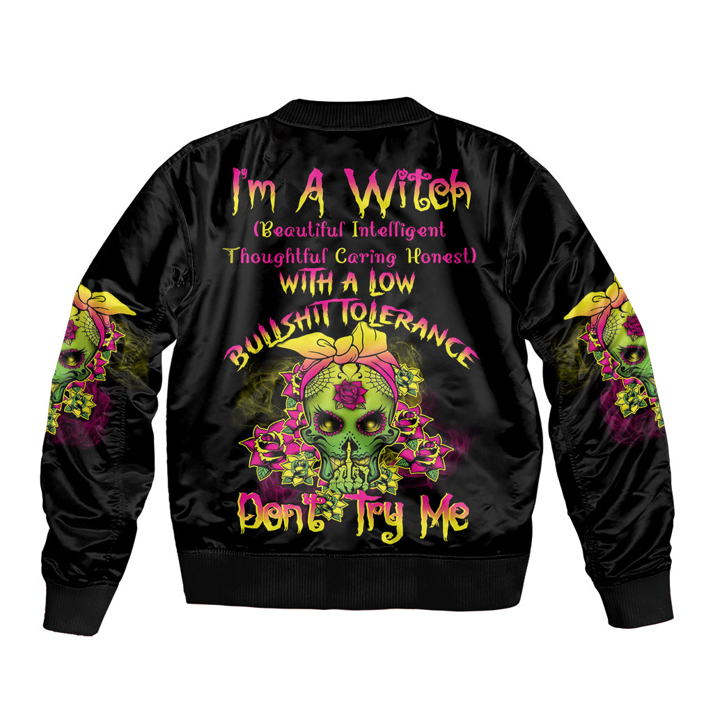 Black unisex bomber jacket with colorful skull graphic on back, ribbed cuffs and hem