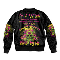 Black unisex bomber jacket with colorful skull graphic on back, ribbed cuffs and hem