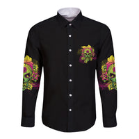Black long-sleeve button shirt with multicolor skull graphic pocket and sleeve art